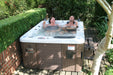 Canadian Spa Company Montreal 24-Jet 3-Person Hot Tub in use