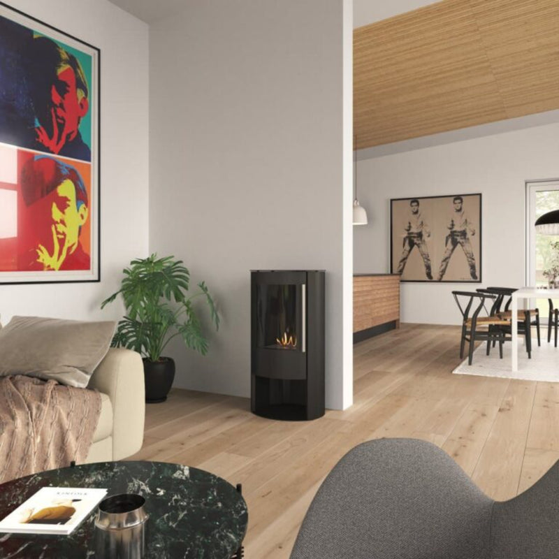 Modern living room with a fireplace, sofa, and abstract art on the wall.