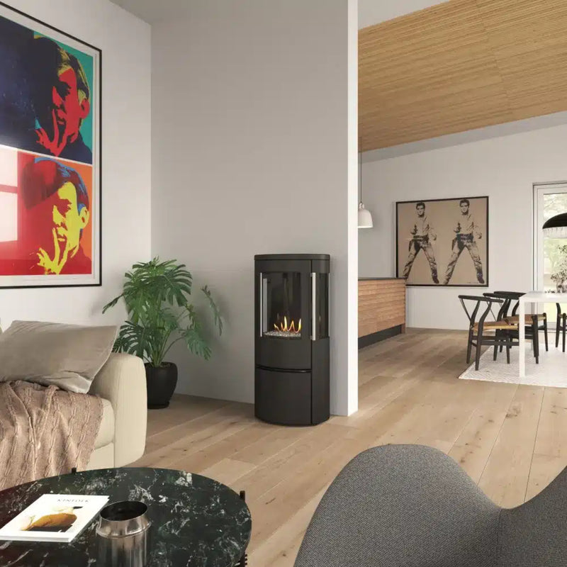 Modern living room with a fireplace, sofa, and abstract art on the wall.